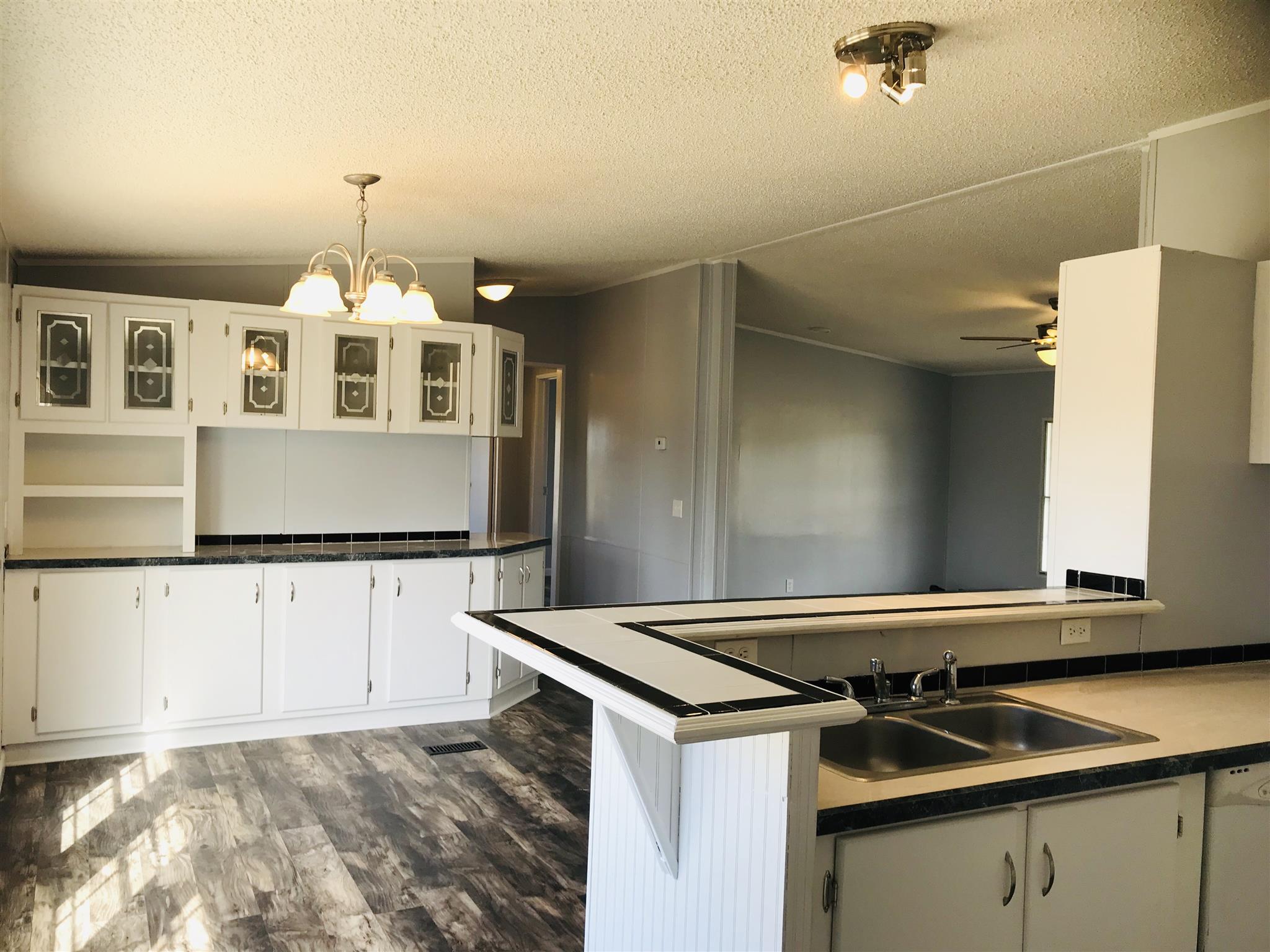 145 Absher Road Portland, TN 37148 - Photo 5 of 22 a kitchen that has a stove and a microwave oven