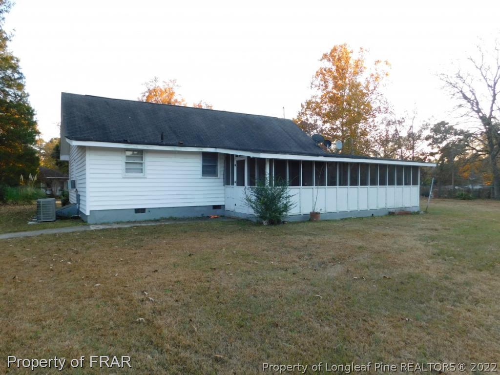 426 Camp Easter Road Carthage, NC 28327 - Photo 3 of 31 a view of a house with a backyard