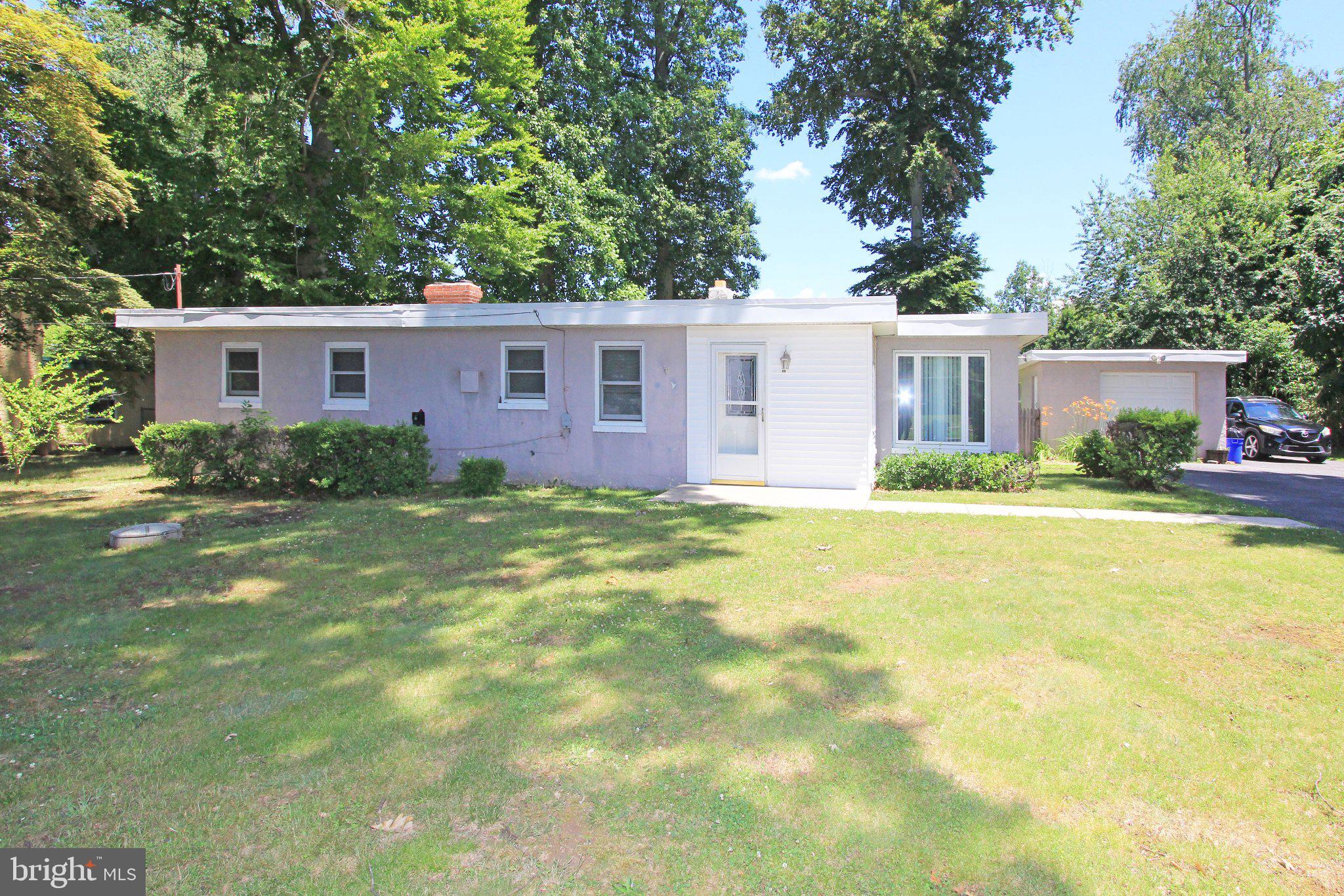 929 Cherry Tree Road Aston, PA 19014 - Photo 2 of 26 Charming home nestled in lush greenery.