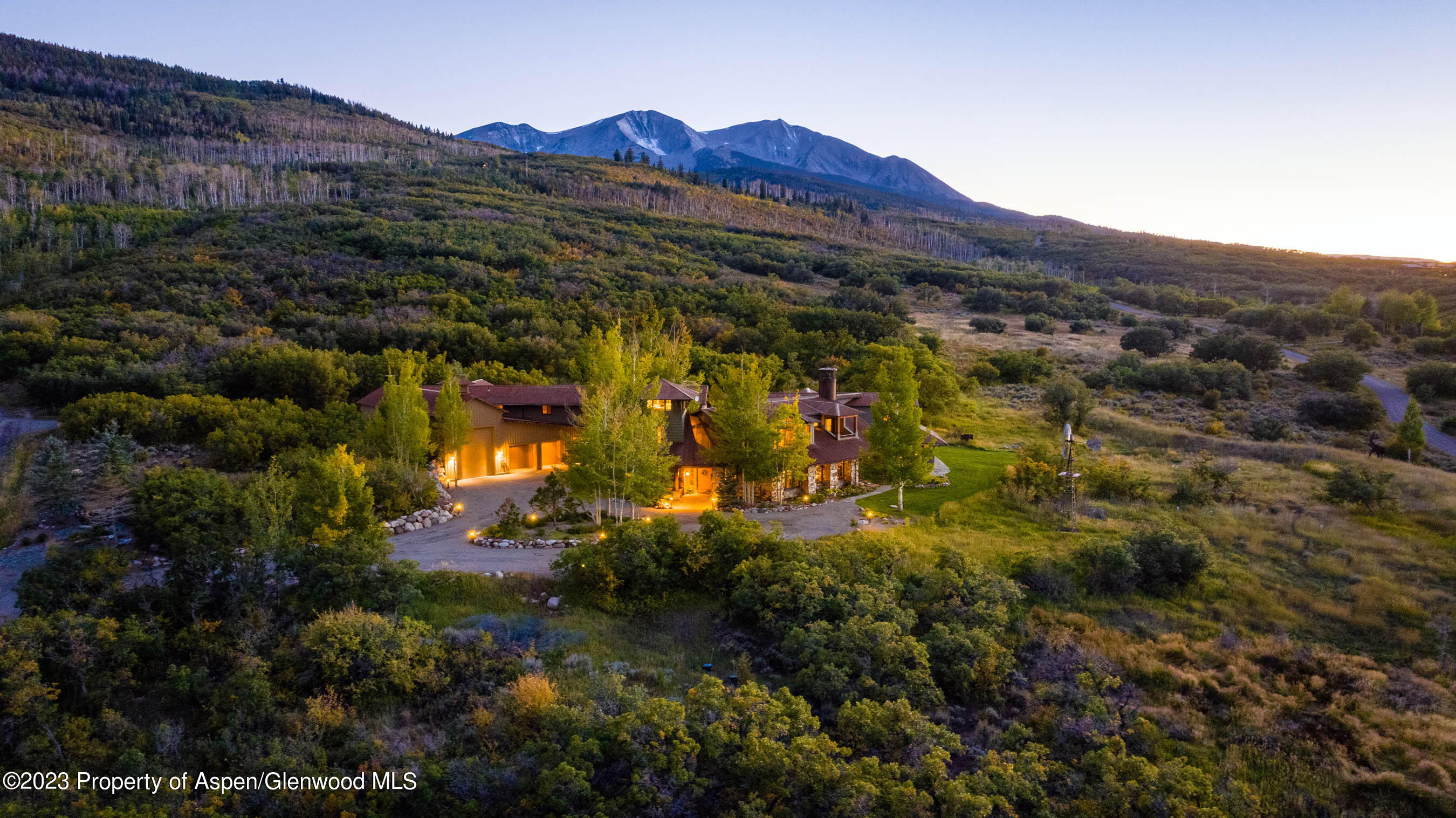 777 Old Herron Road Basalt, CO 81621 - Photo 1 of 43 a view of a lush green hillside and houses