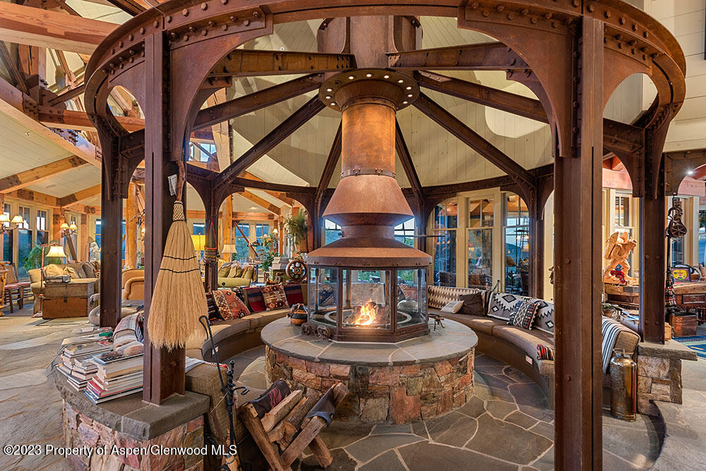 777 Old Herron Road Basalt, CO 81621 - Photo 12 of 43 a view of a chair and tables in the patio