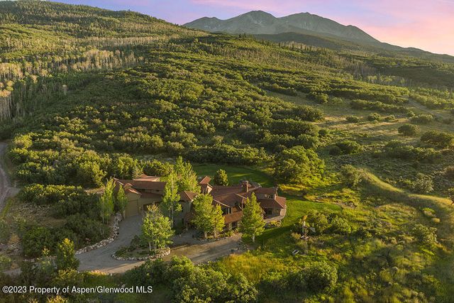 a view of a city with an ocean view