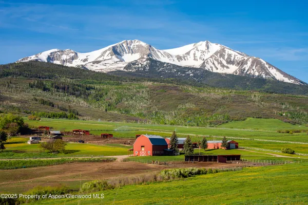 a view of a street with an ocean view