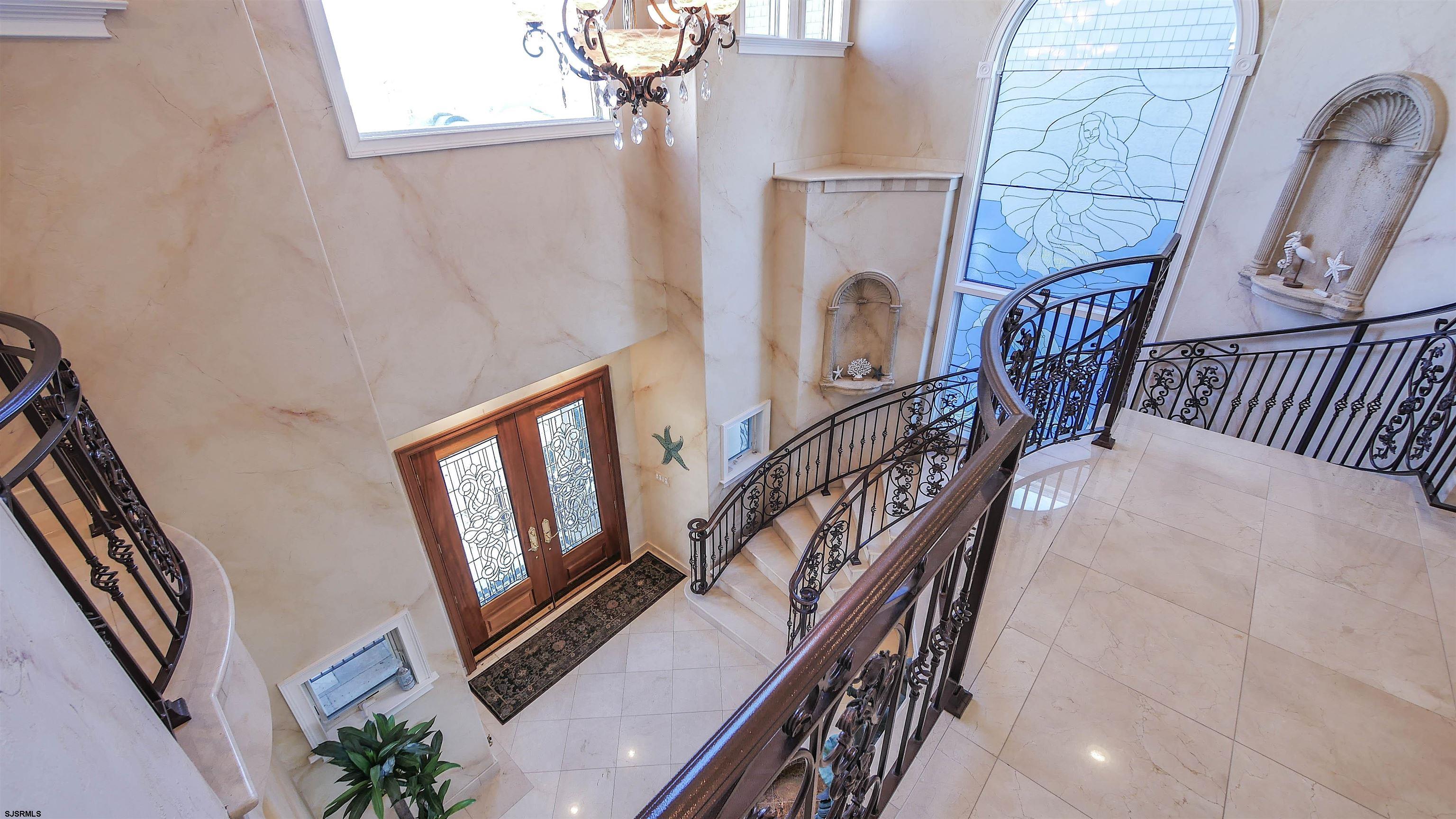 530 West Shore Drive, Unit DIRECT BAYFRONT Brigantine, NJ 08203 - Photo 25 of 63 a view of stairs and with furniture