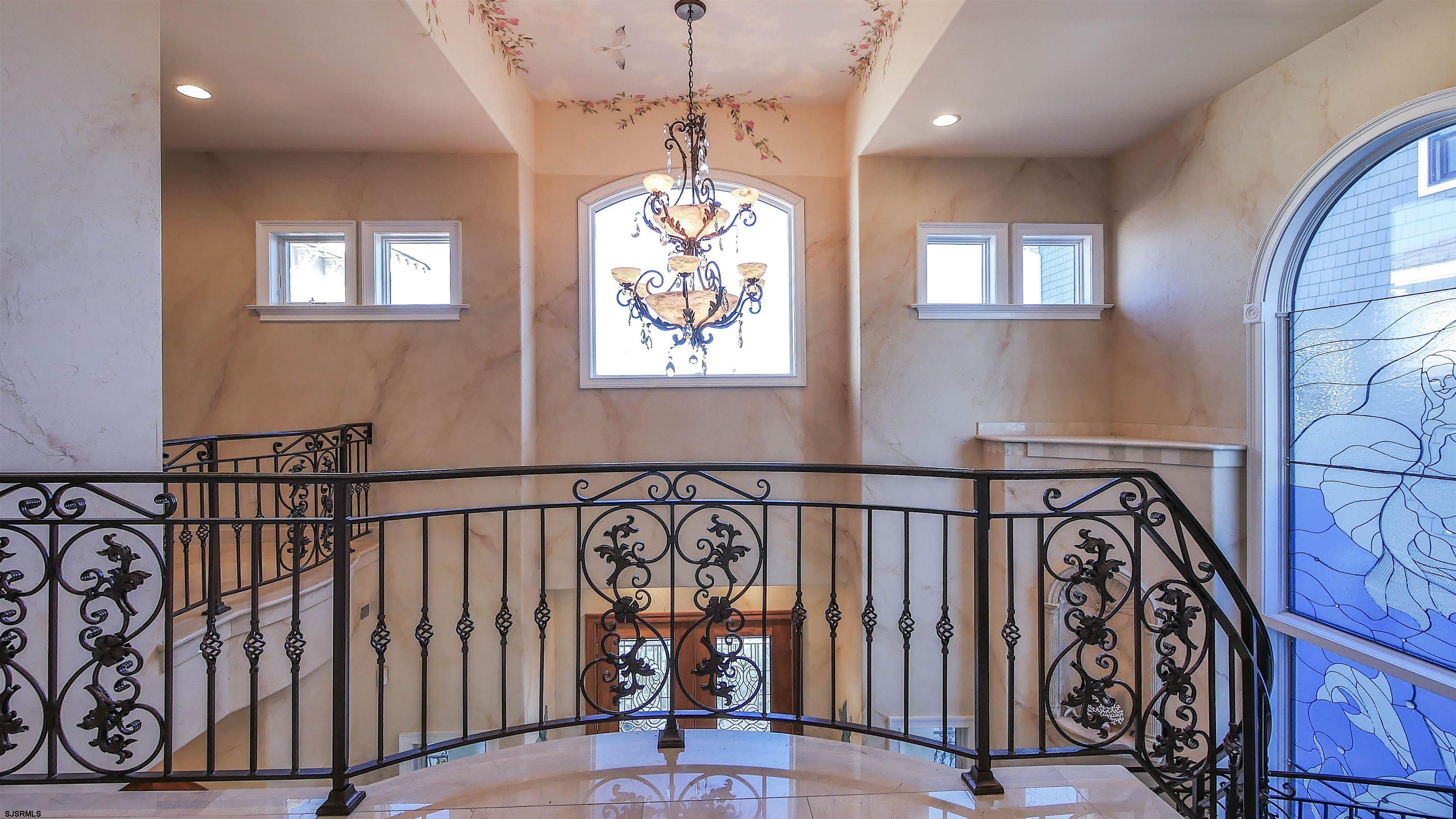 530 West Shore Drive, Unit DIRECT BAYFRONT Brigantine, NJ 08203 - Photo 26 of 63 a view of a hallway with wooden floor
