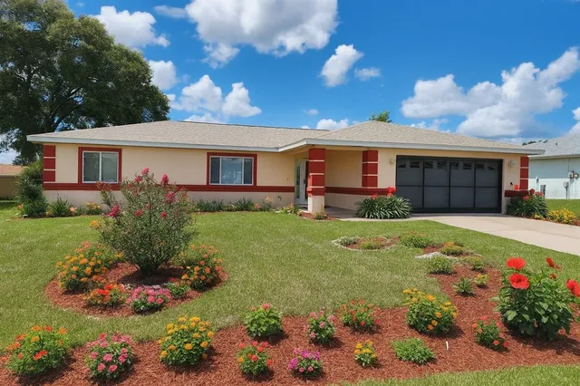 front view of a house with a yard