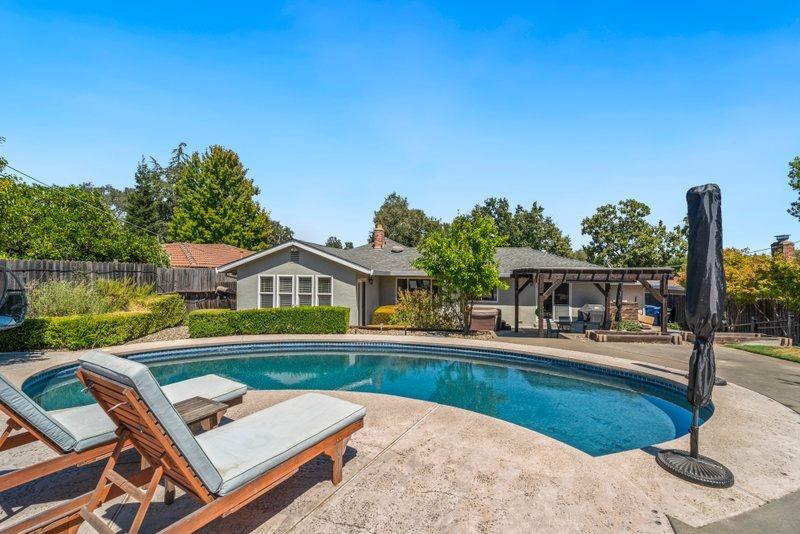 a house with river in front of it