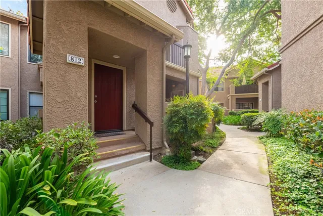 a view of a pathway besides a house