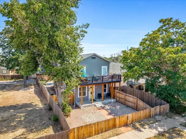 a view of house with patio outdoor seating