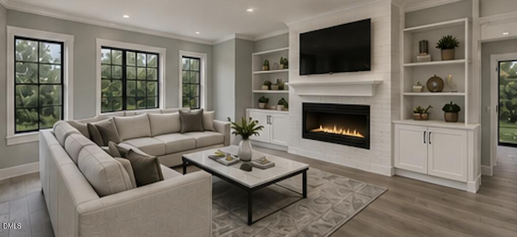 405 Alston Street Raleigh, NC 27601 - Photo 4 of 23 a living room with furniture a flat screen tv and a fireplace