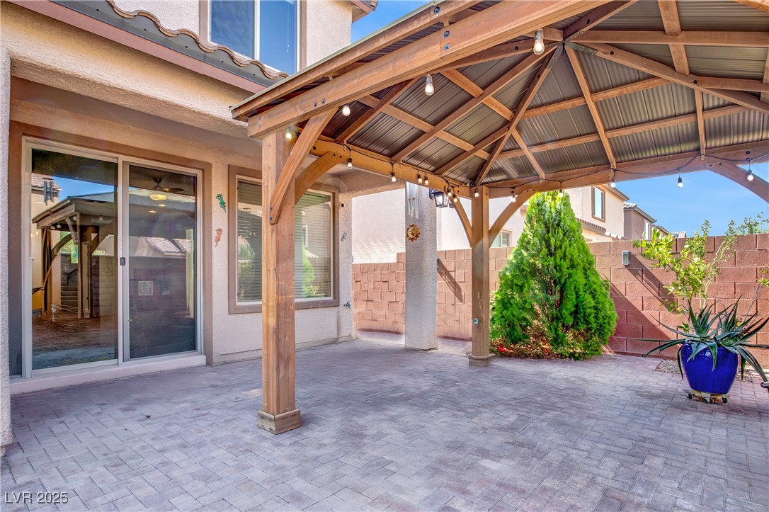 10976 Bluebell Basin Road Las Vegas, NV 89179 - Photo 19 of 40 View of patio / terrace featuring a gazebo