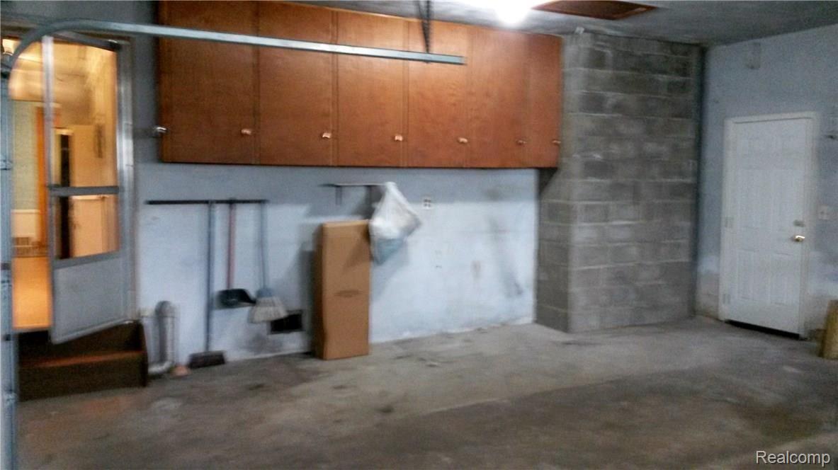 1195 Torpey Road Troy, MI 48083 - Photo 31 of 39 Wall Shelving in the attached Garage.