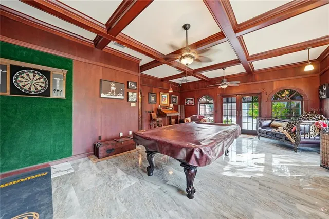 a room with furniture and wooden floor