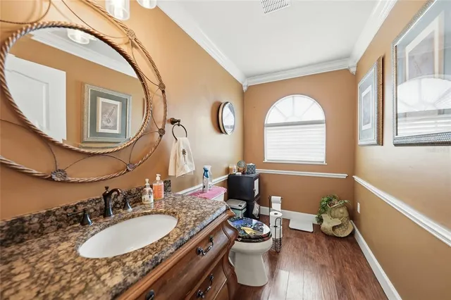 a bed room with furniture and a chandelier