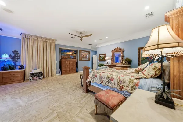 a living room with furniture and large window