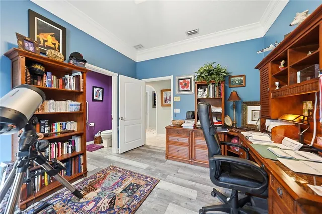 a view of a workspace with furniture