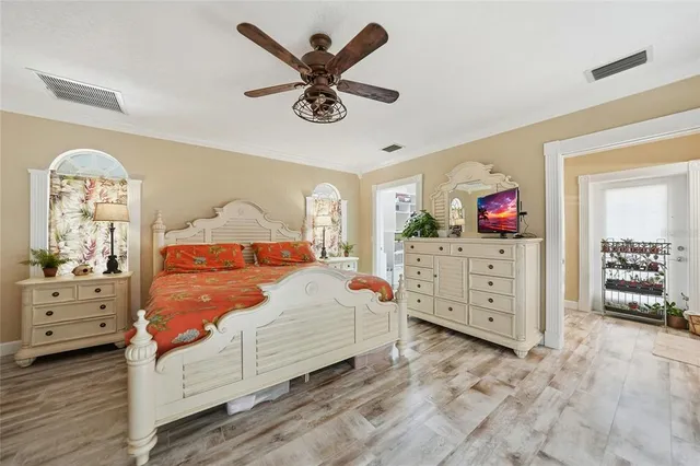 a view of a chair and tables in the balcony