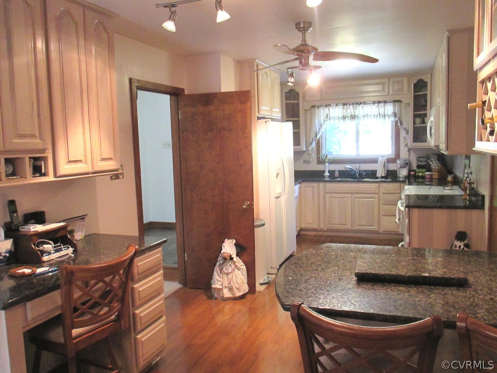 1704 Headwaters Road Midlothian, VA 23113 - Photo 10 of 22 a kitchen with granite countertop sink and stove