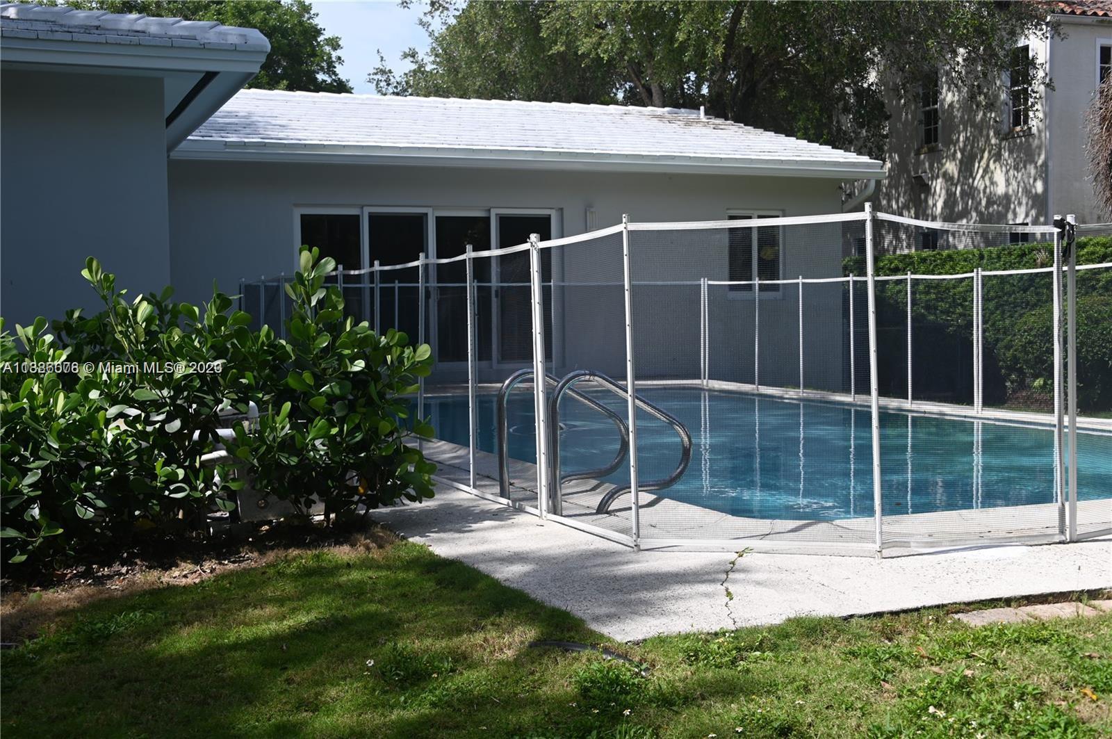 Granada Coral Gables, FL 33134 - Photo 11 of 13 a house view with a garden space