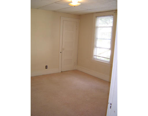 91-93 Orange Street Springfield, MA 01108 - Photo 14 of 17 a view of an empty room with a window