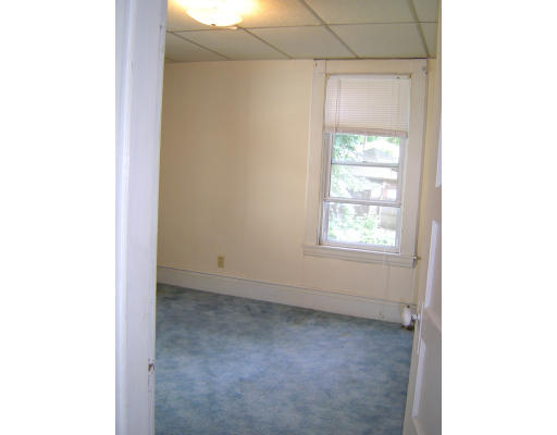 91-93 Orange Street Springfield, MA 01108 - Photo 15 of 17 a view of an empty room with a window