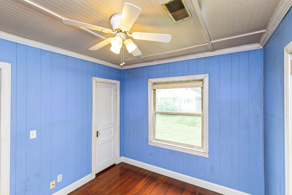 298 Franklin Road Lebanon, TN 37087 - Photo 14 of 34 a view of an empty room with wooden floor and a window