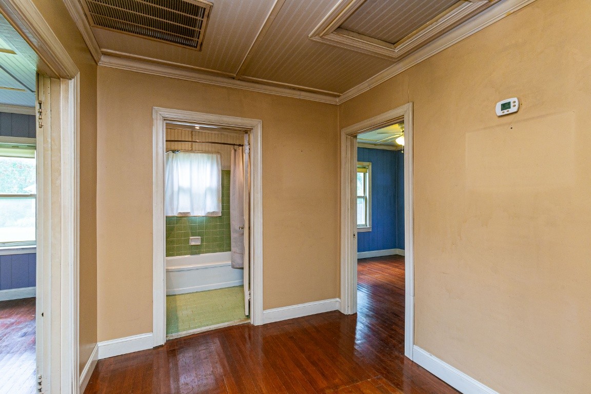298 Franklin Road Lebanon, TN 37087 - Photo 19 of 34 a view of an empty room with wooden floor and a window