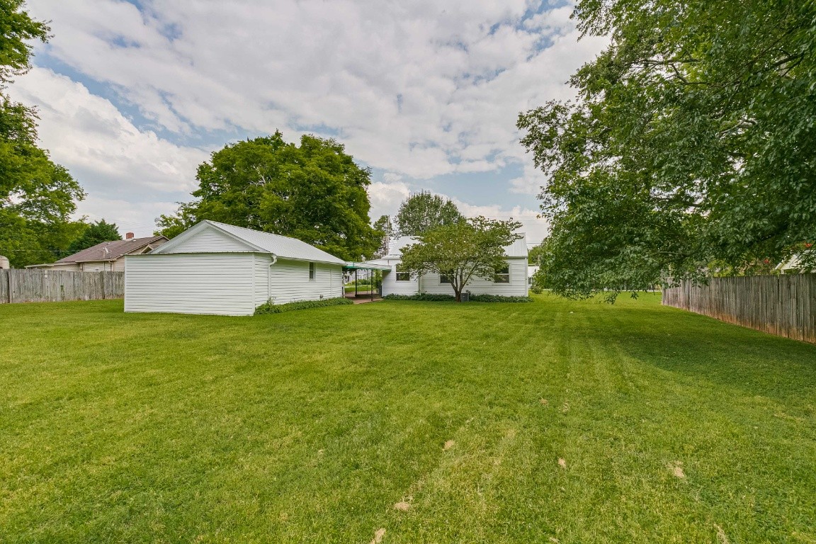 298 Franklin Road Lebanon, TN 37087 - Photo 31 of 34 a view of a house with a yard and a large tree