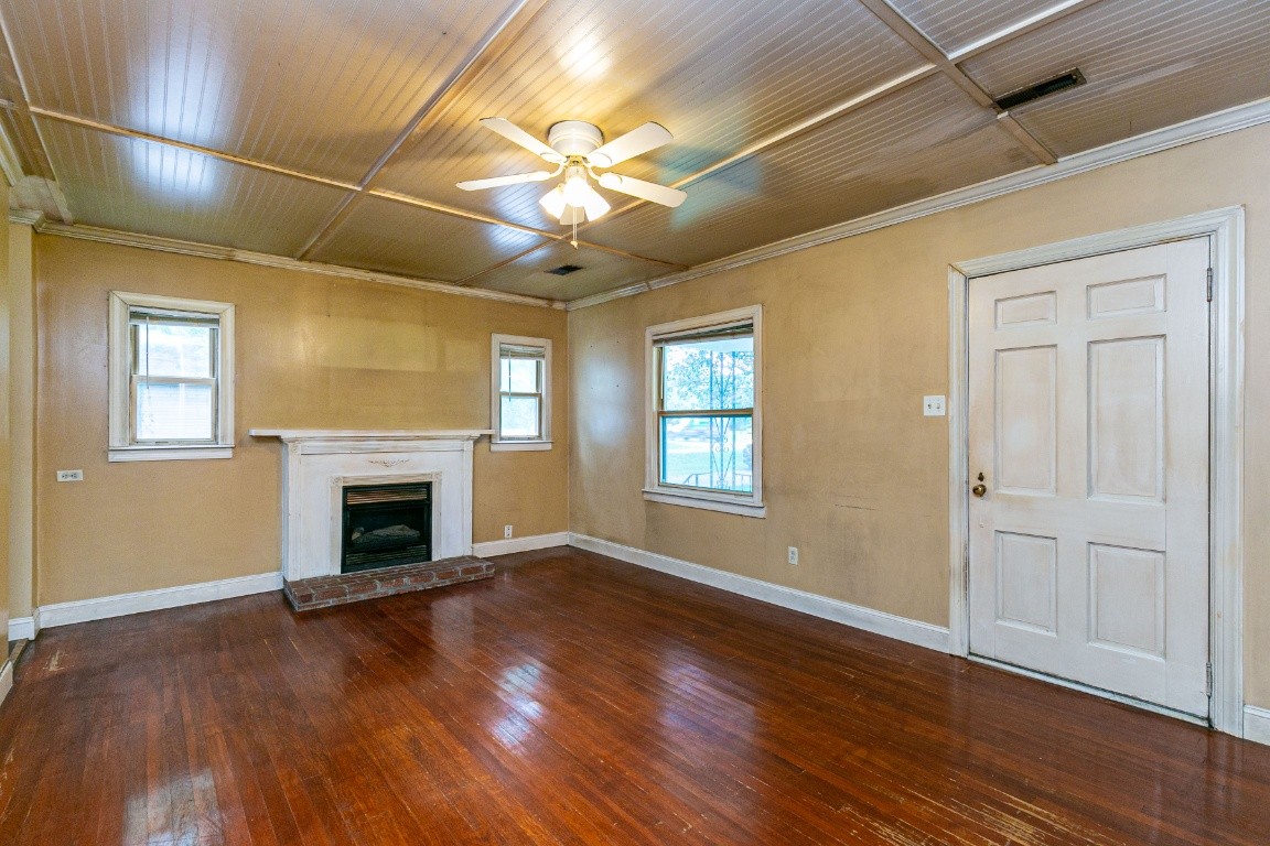 298 Franklin Road Lebanon, TN 37087 - Photo 6 of 34 an empty room with wooden floor fan and windows