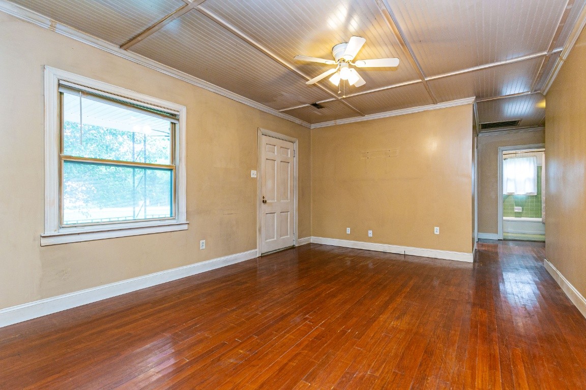 298 Franklin Road Lebanon, TN 37087 - Photo 7 of 34 a view of an empty room with wooden floor and a window