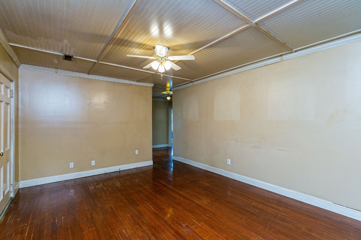 298 Franklin Road Lebanon, TN 37087 - Photo 9 of 34 a view of a room with wooden floor and a ceiling fan