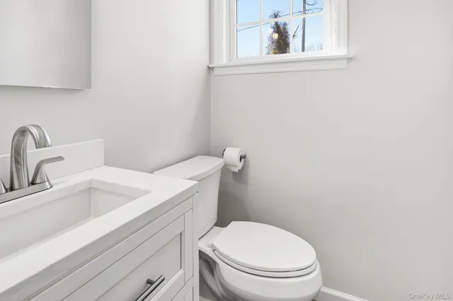 a view of a hallway with a window