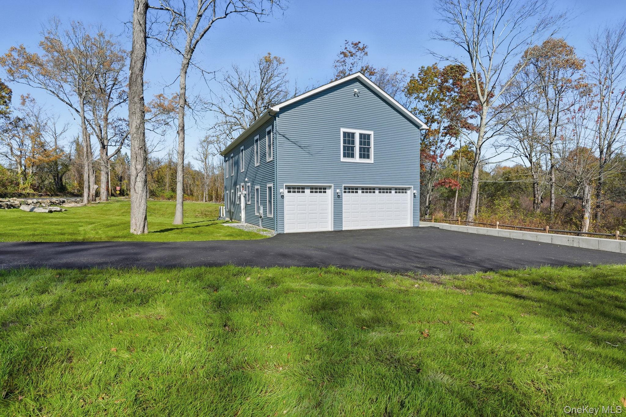 40 Cushman Road Patterson, NY 12563 - Photo 39 of 40 a view of a house with a yard