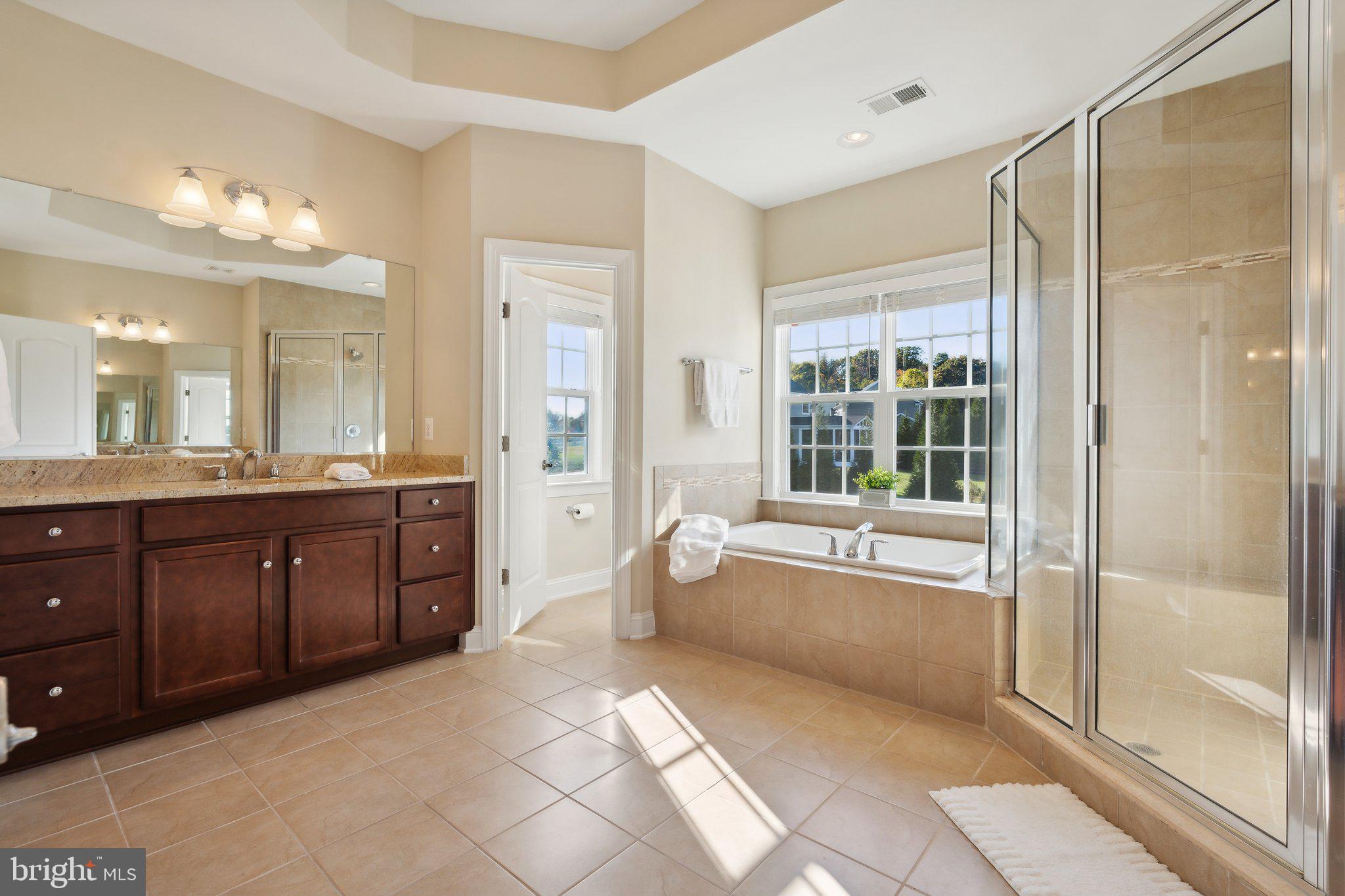 18325 Wild Raspberry Drive Purcellville, VA 20132 - Photo 34 of 76 2 large vanities and water closet