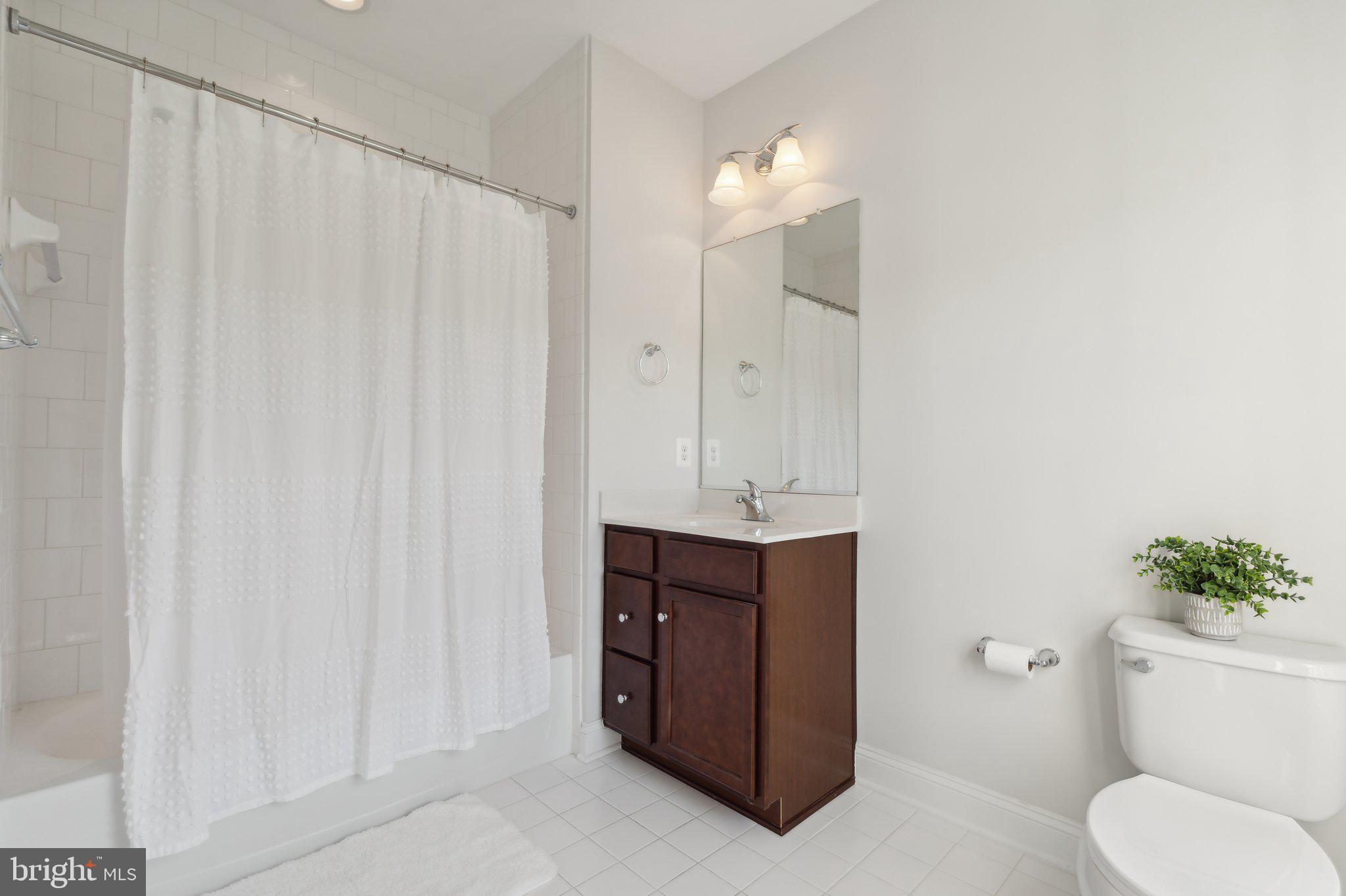 18325 Wild Raspberry Drive Purcellville, VA 20132 - Photo 44 of 76 private bath with tile flooring