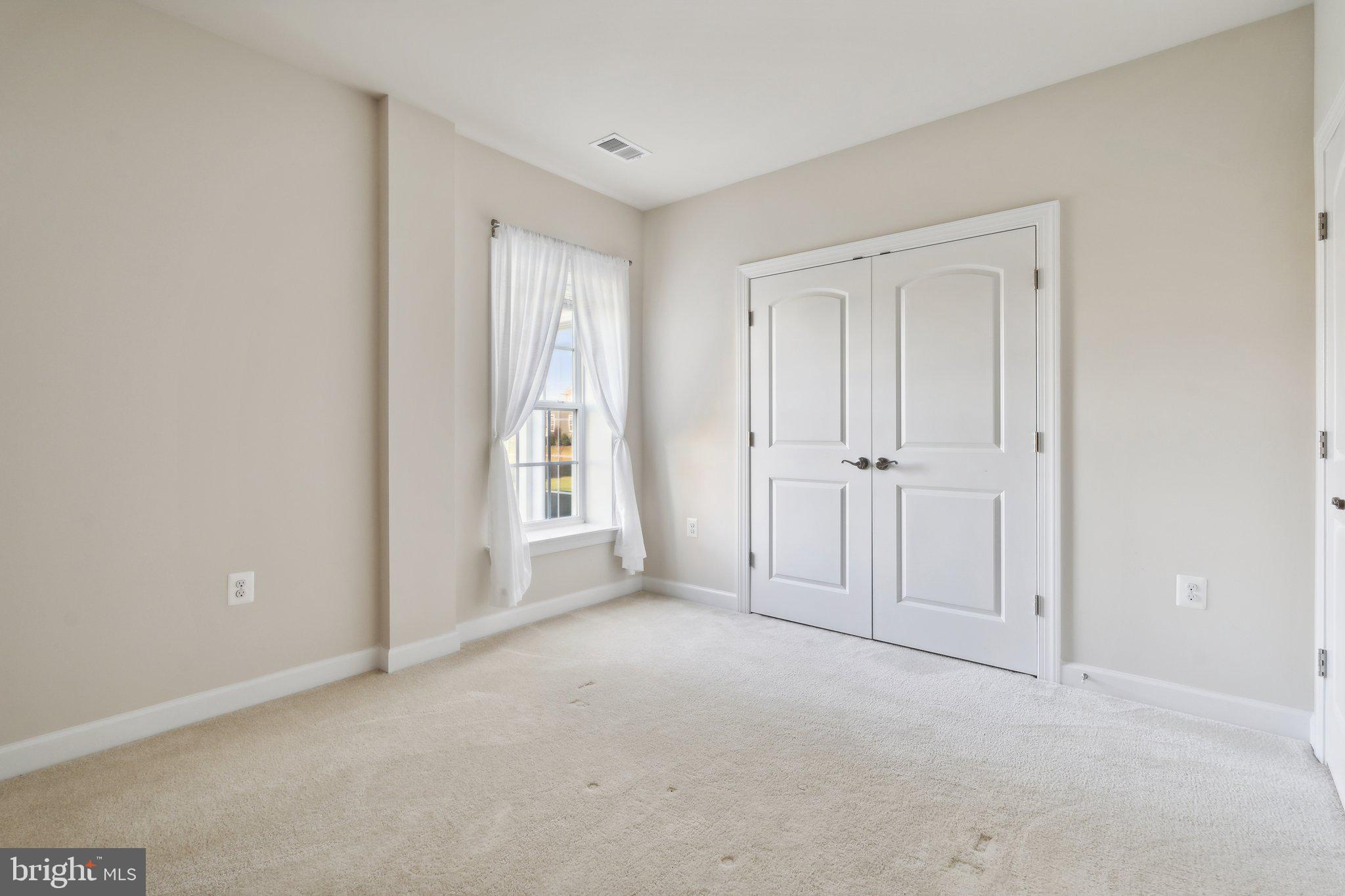 18325 Wild Raspberry Drive Purcellville, VA 20132 - Photo 51 of 76 closet and large window bedroom 5