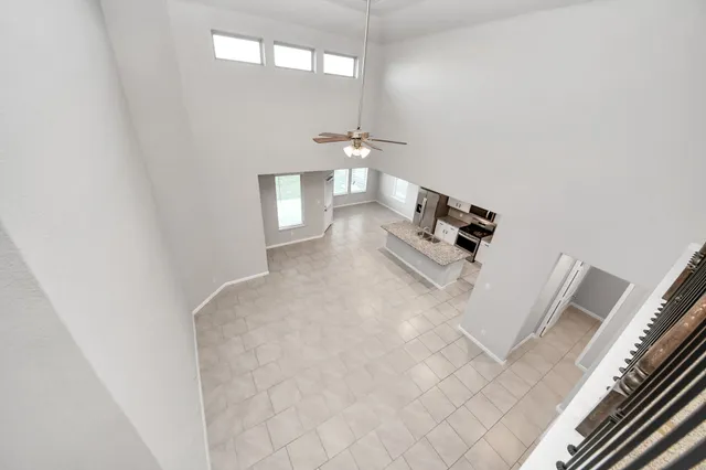 a view of a hallway with entryway