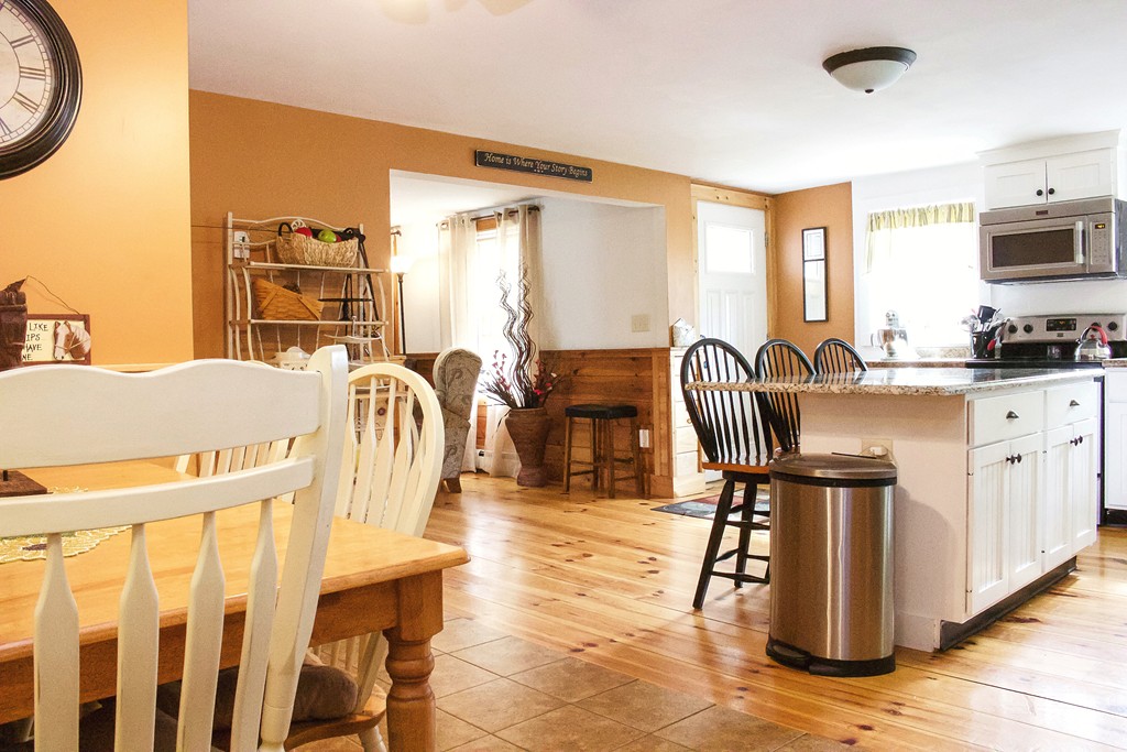 35 Downfall Road Newbury, MA 01922 - Photo 3 of 28 a view of a kitchen with furniture and wooden floor