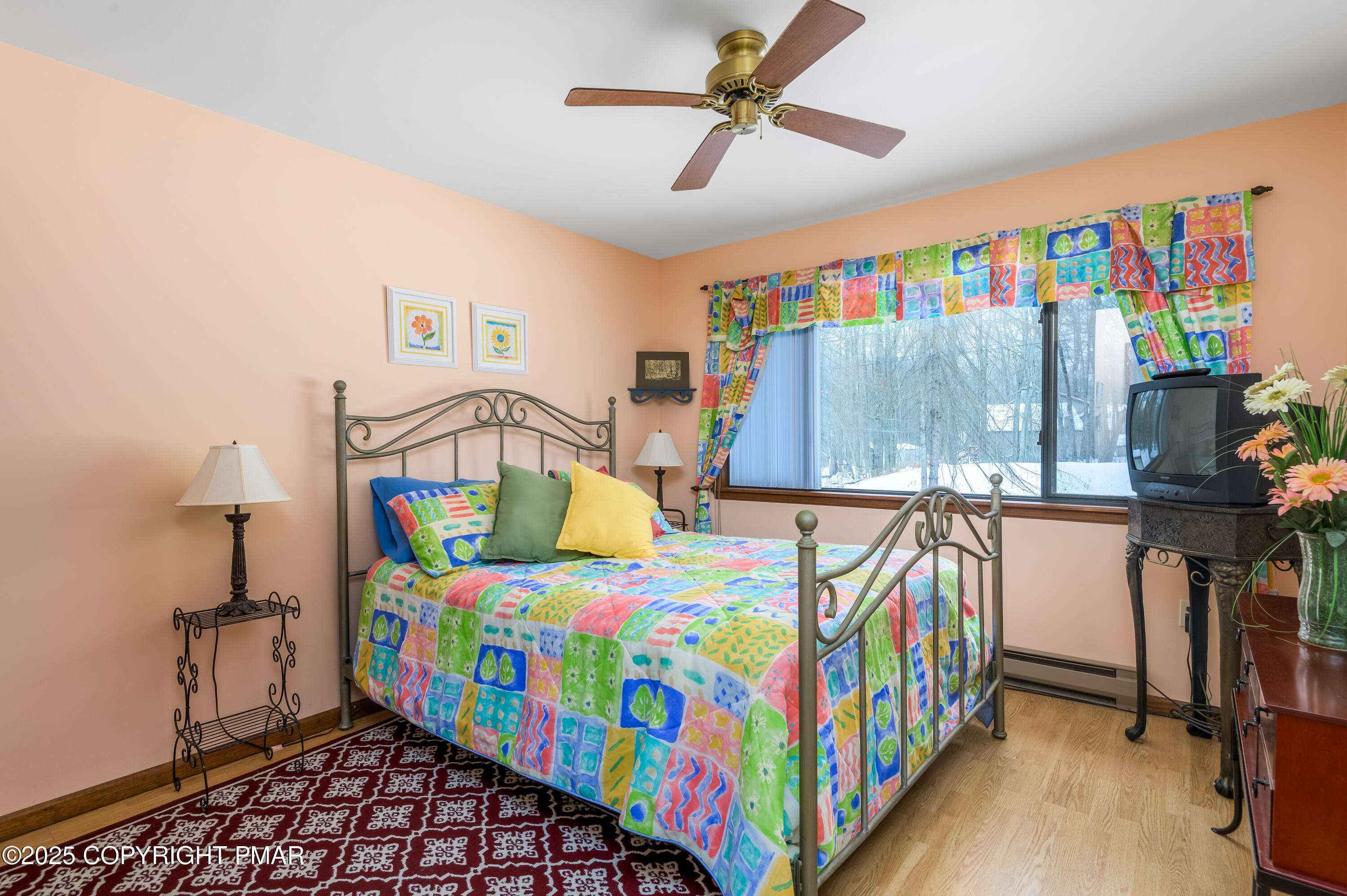 233 Pontiac Path Pocono Lake, PA 18347 - Photo 26 of 46 a bedroom with a bed and a window