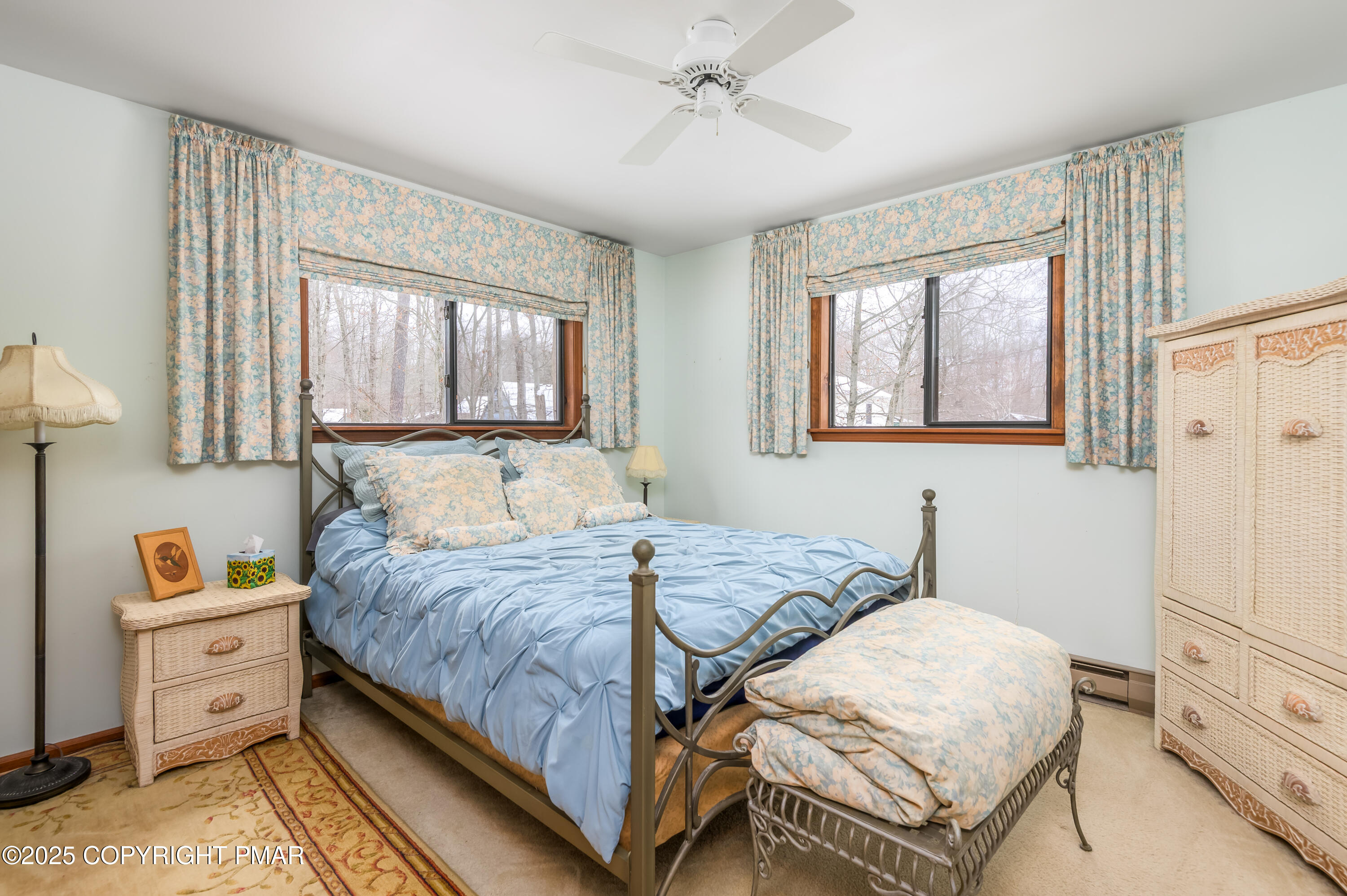 233 Pontiac Path Pocono Lake, PA 18347 - Photo 28 of 46 a bedroom with a bed and wooden floor