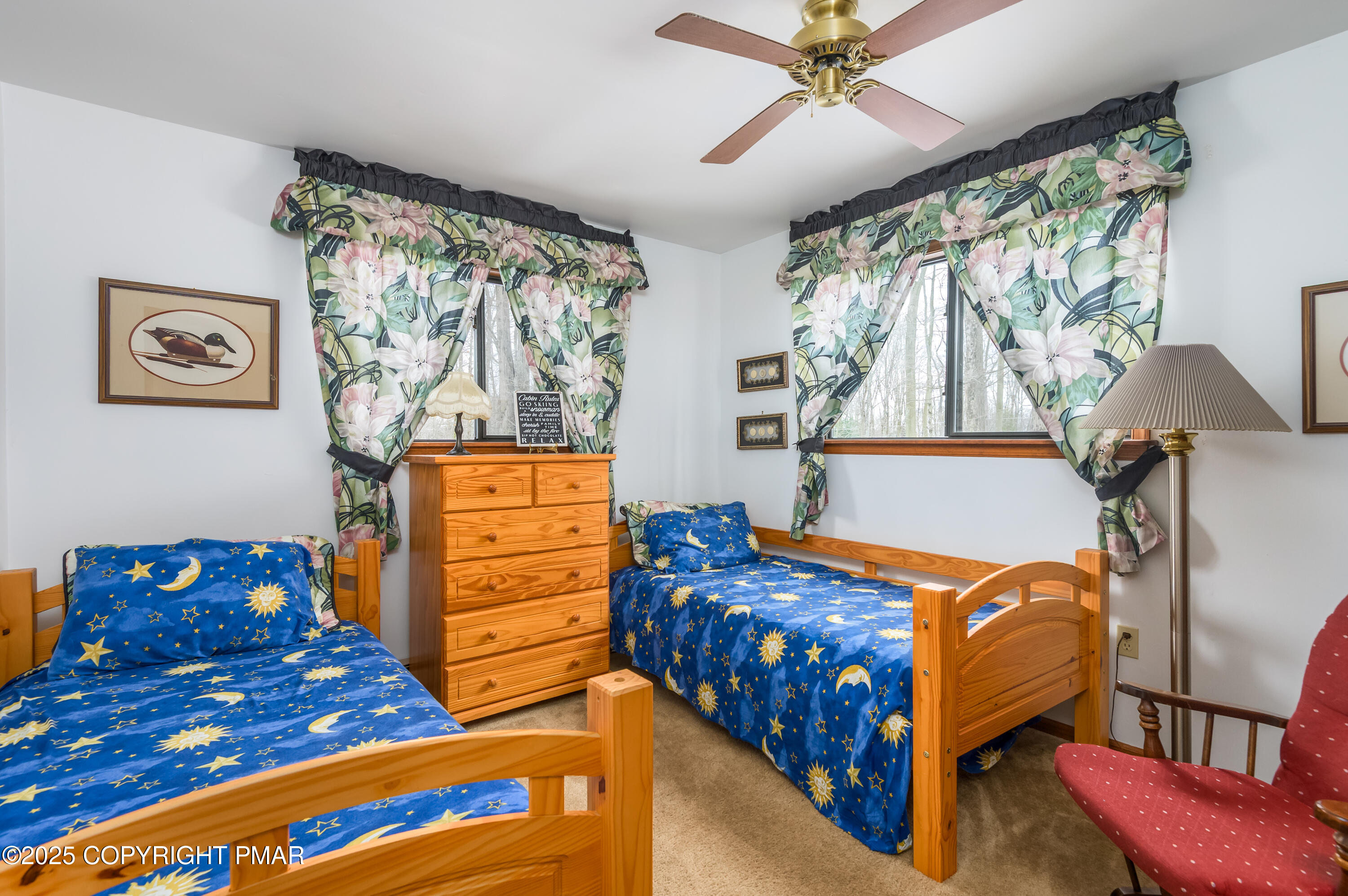 233 Pontiac Path Pocono Lake, PA 18347 - Photo 32 of 46 a bedroom with a bed and a window
