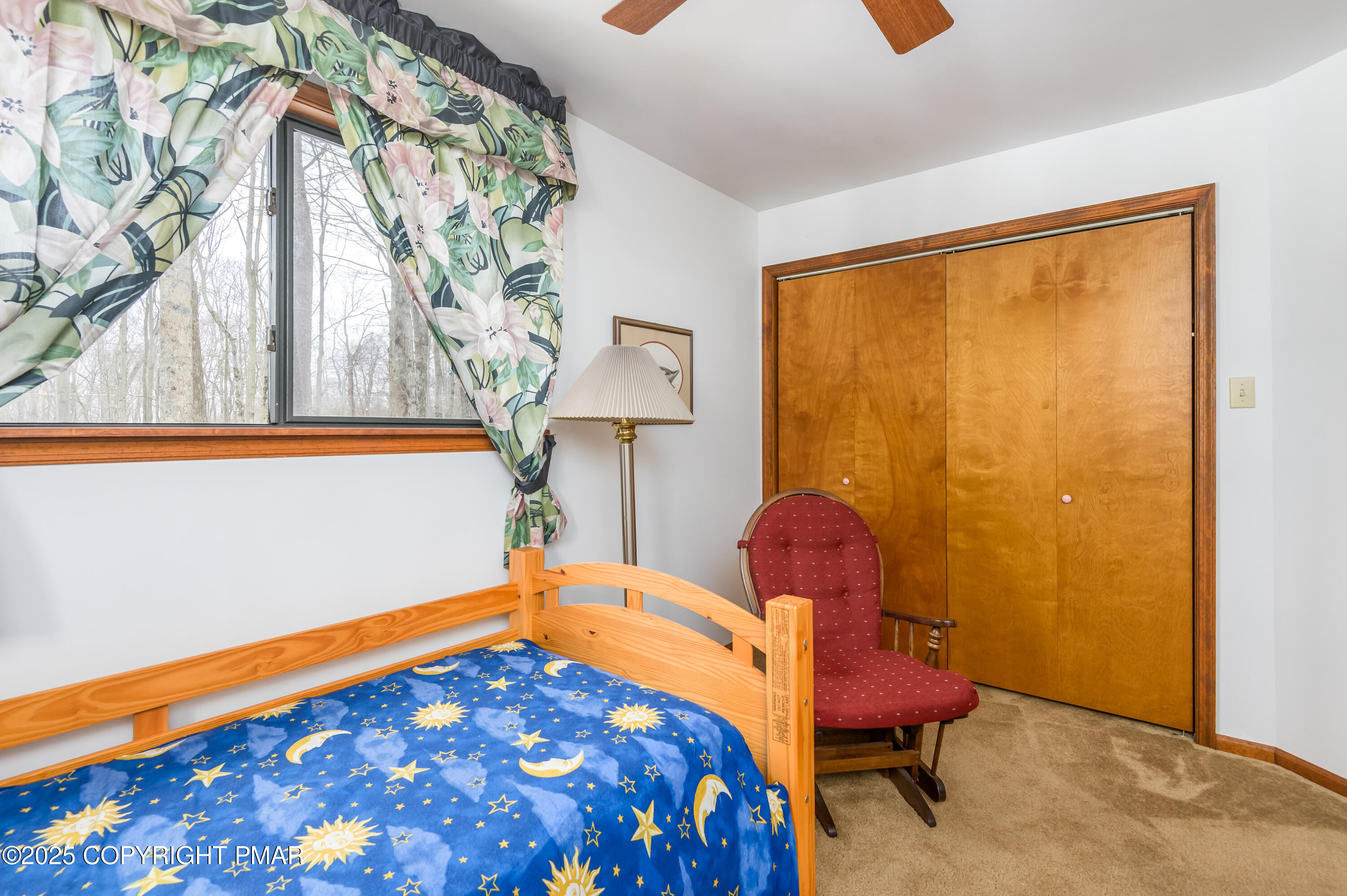 233 Pontiac Path Pocono Lake, PA 18347 - Photo 34 of 46 a bedroom with a bed and a window