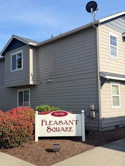 a sign on the side of a building