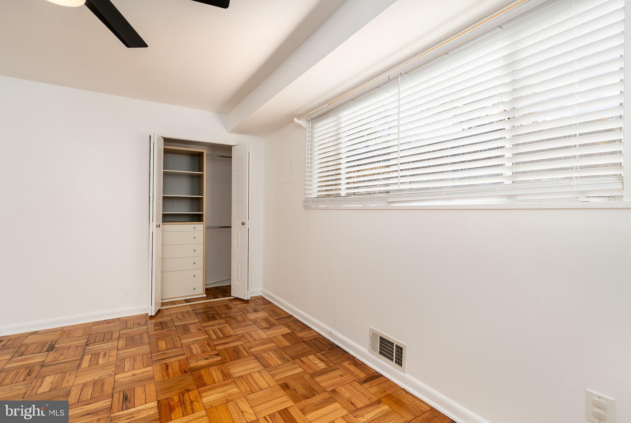 10423 Montrose Avenue, Unit 10423 Bethesda, MD 20814 - Photo 15 of 22 a view of a livingroom with a window