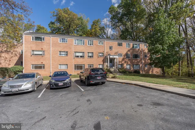 a car parked in front of a house