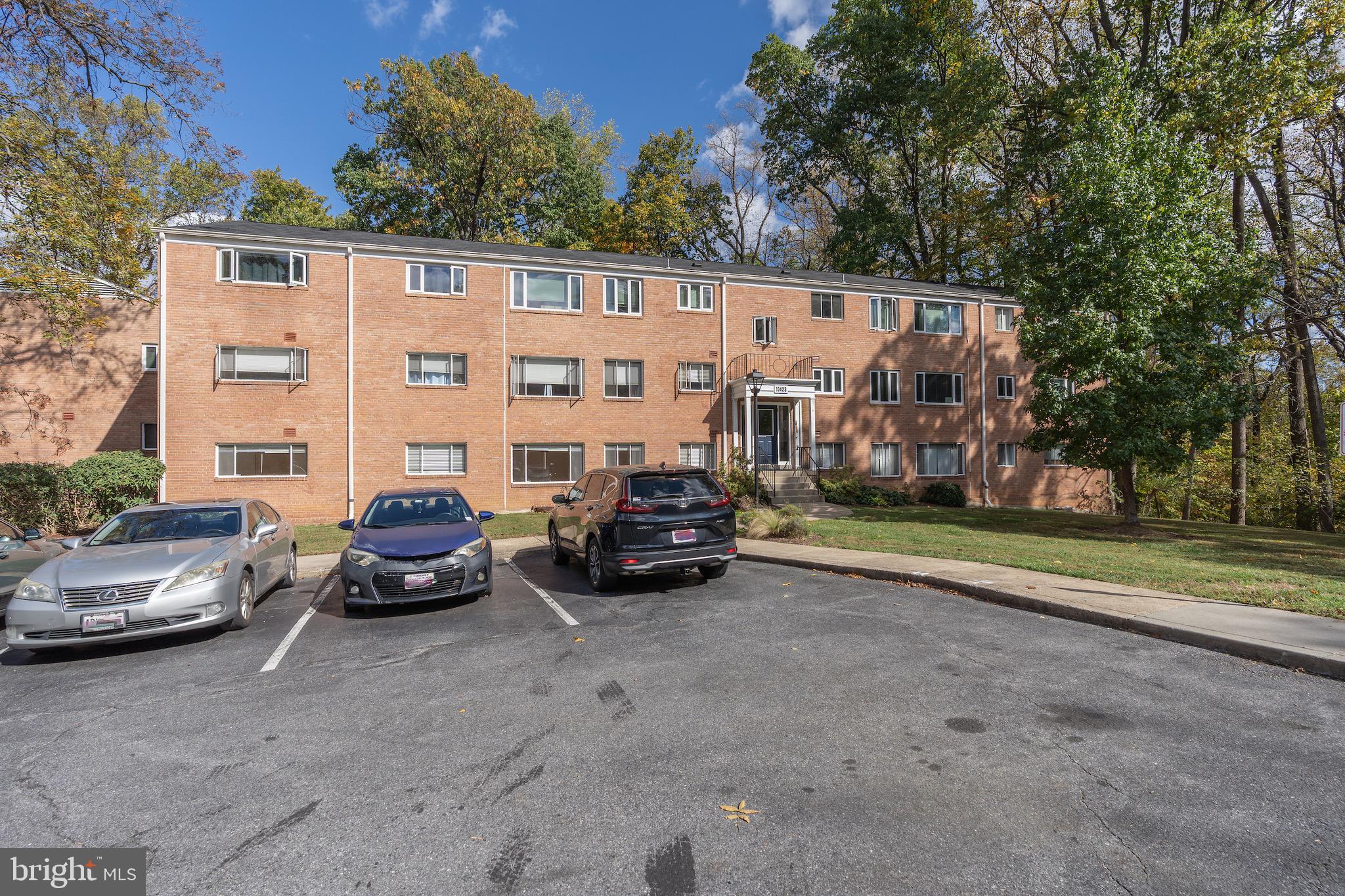 10423 Montrose Avenue, Unit 10423 Bethesda, MD 20814 - Photo 17 of 22 a car parked in front of a house