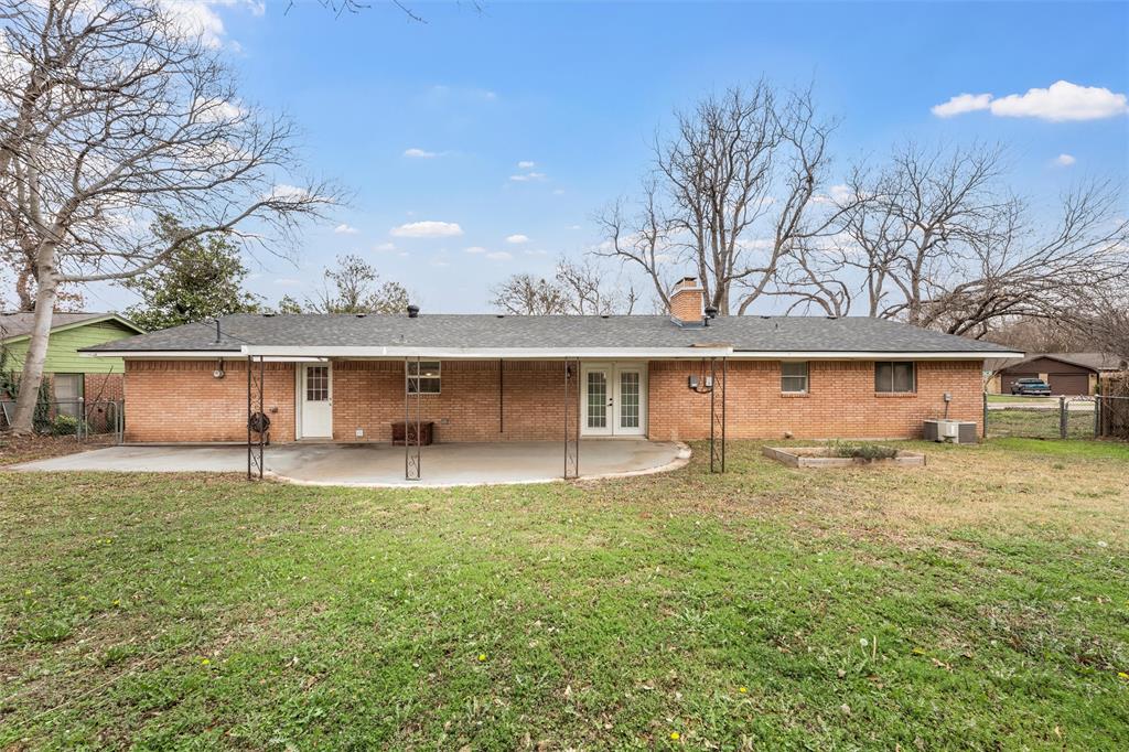 2208 Lake Forest Drive Waco, TX 76708 - Photo 26 of 28 a house view with a garden space