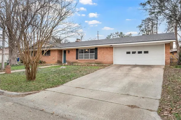 a front view of house with yard