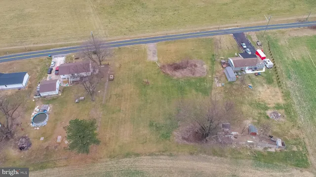 a bathroom with a sink mirror and vanity