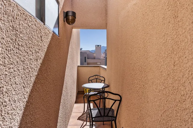 a view of a bedroom and bathroom